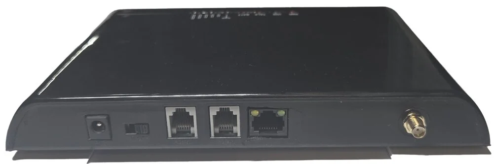 STS-7116 rear panel showing 2 RJ-11 ports for voice communication and 1 RJ-45 port for data connectivity, power input, and external antenna connector